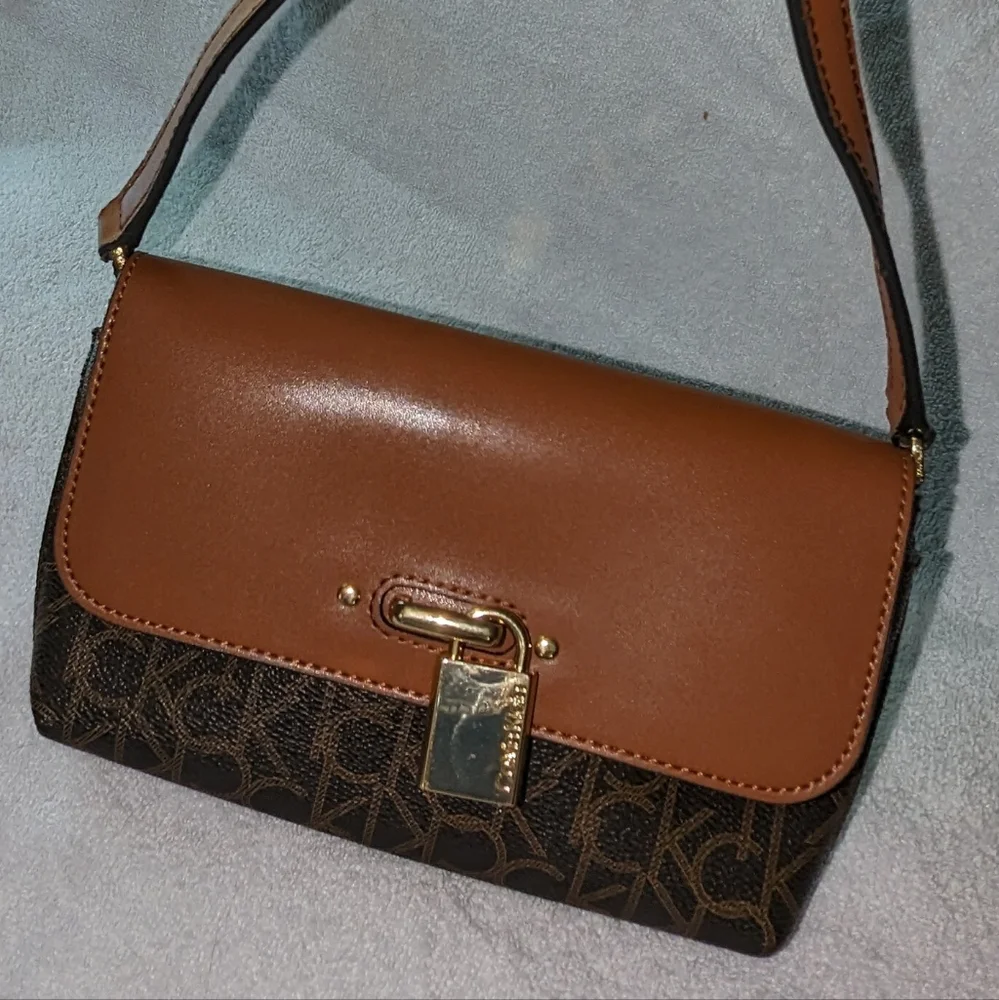 Calvin Klein brown signature Roxy crossbody bag.